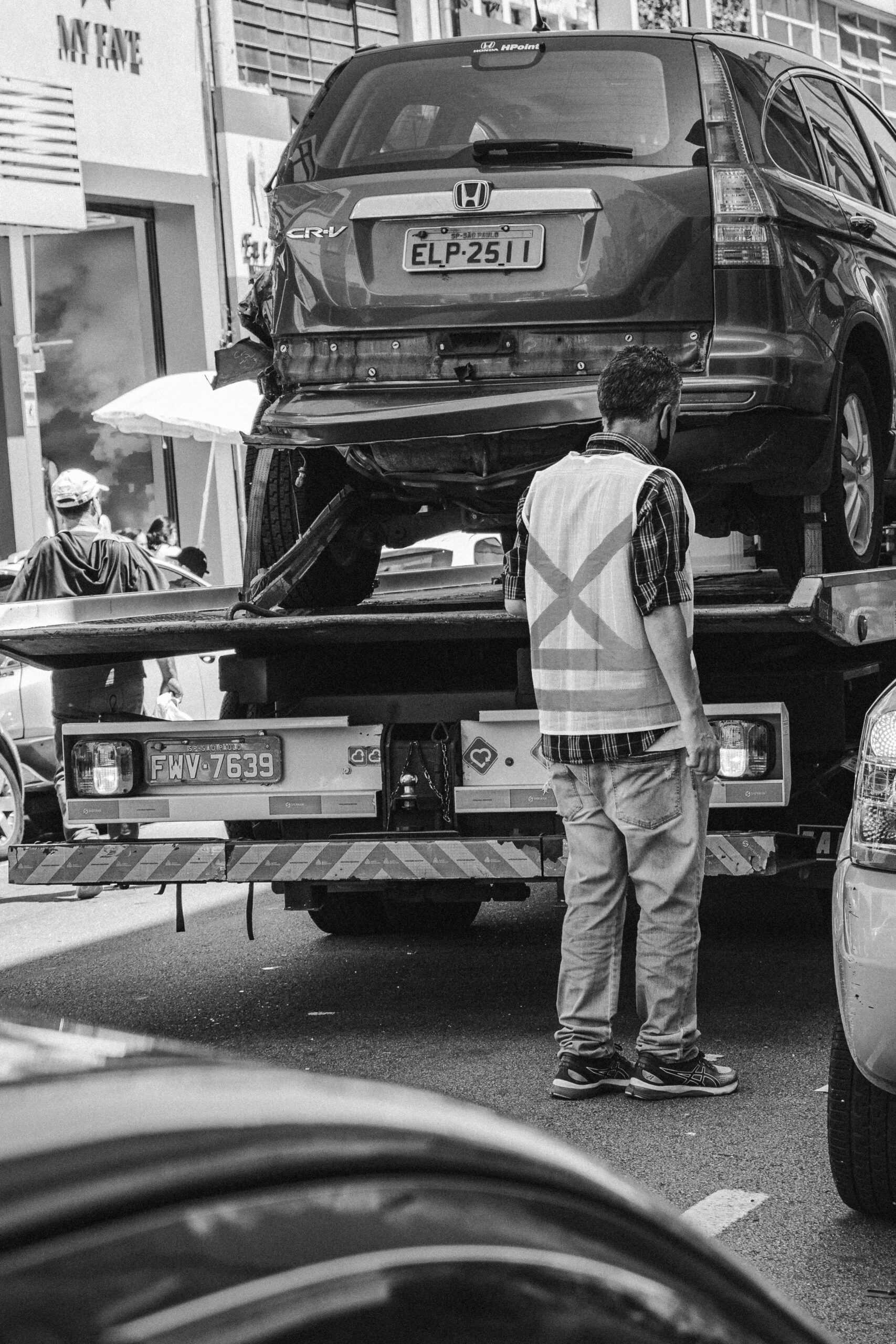 a car being loaded onto a tow truck after a car accident